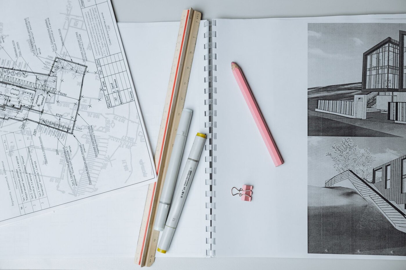 Architectural drawings and measuring tools illustrating the need to assess layout and potential carefully